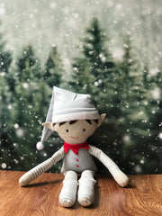 Duende niño elf navideño en tonos neutros pelo cafe obscuro