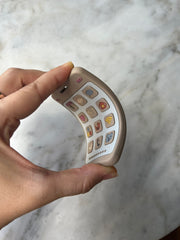 Gift bag de lentes + mordedera celular tonos latte