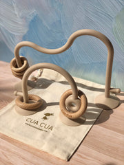 Juguete de silicón con aros de madera y succión (Varios colores)