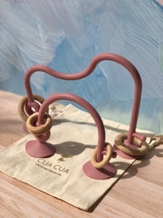 Juguete de silicón con aros de madera y succión (Varios colores)