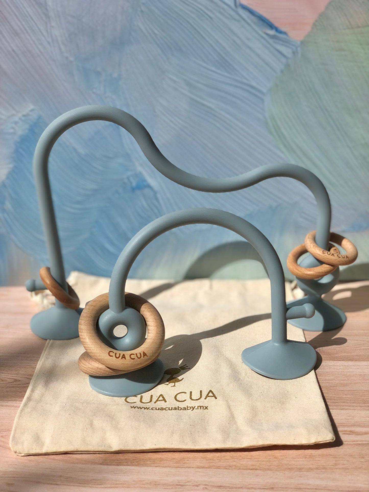 Juguete de silicón con aros de madera y succión (Varios colores)