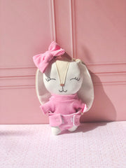 Sonaja en forma de conejo con moño en tono rosa (15 cm)