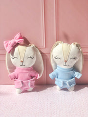 Sonaja en forma de conejo con moño en tono rosa (15 cm)