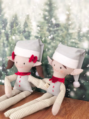 Duende niño elf navideño en tonos neutros pelo cafe obscuro