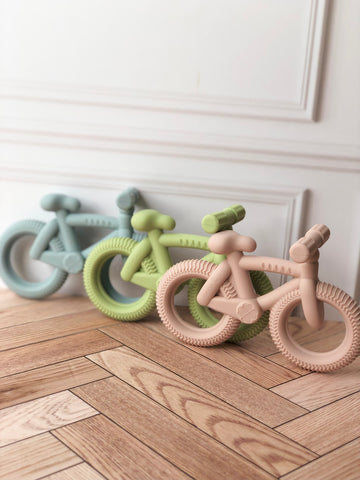 Mordedera en forma de bicicleta ( 3 colores)