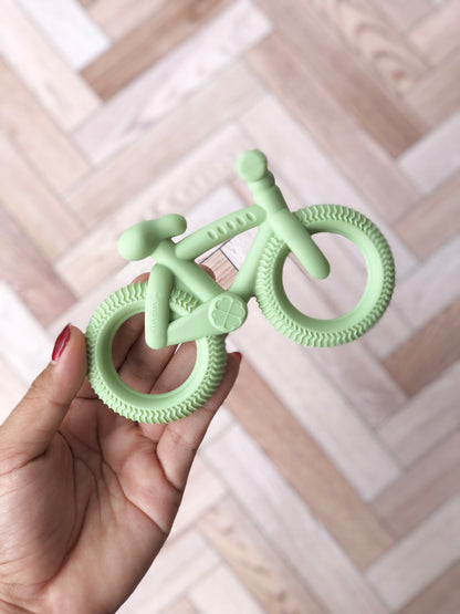 Mordedera en forma de bicicleta ( 3 colores)