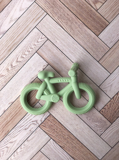 Mordedera en forma de bicicleta ( 3 colores)