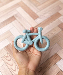 Mordedera en forma de bicicleta ( 3 colores)