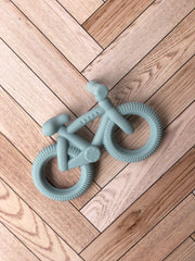 Mordedera en forma de bicicleta ( 3 colores)