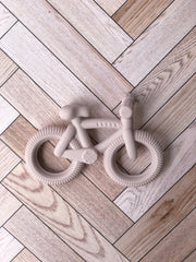 Mordedera en forma de bicicleta ( 3 colores)