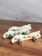 Mordedera mini pop it en forma de carrito ( Varios colores)