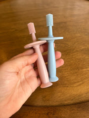 Cepillito mordedera de silicón ( 2 colores)