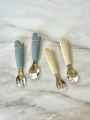 Cubiertos de silicón y acero en forma de patito (Gris y beige)